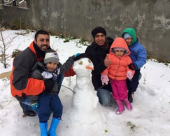 بالصور: اهالي من يافا، اللد والرملة يستمتعون بأوقاتهم باللعب في الثلوج 